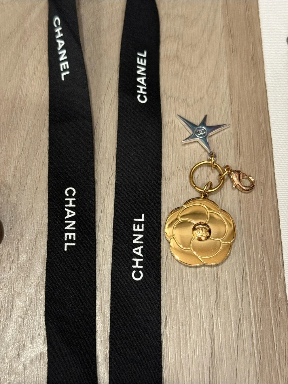 CHANEL ribbons, charms, camellias